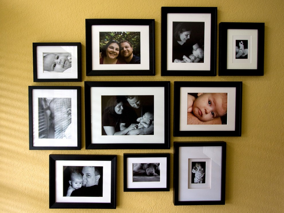 Photos of kids with family on the wall.Photo courtesy : Flikr.com